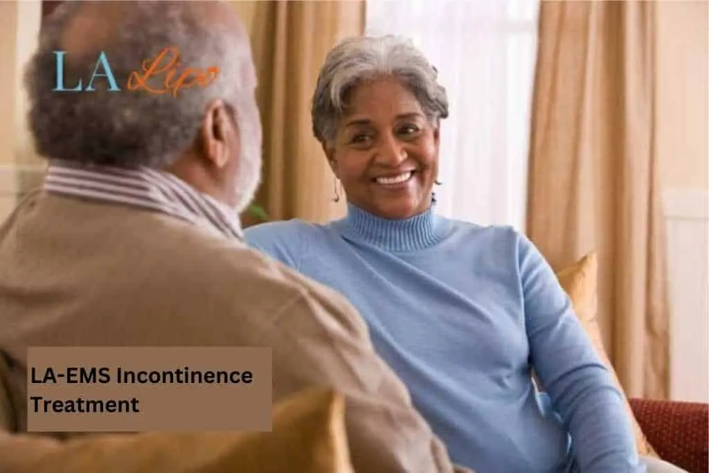 Couple sat smiling at each other - LA-EMS treatment Hounslow Heath