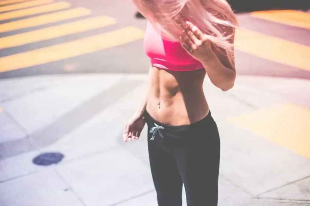 Woman with toned stomach after LA-EMS Body Sculpting Treatment Hounslow Heath 